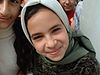 Leende flicka i Bagdad i Irak