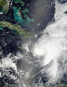 Ernesto som en kategori 1-orkan söder om Haiti