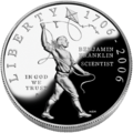 En amerikansk silverdollar utgiven 2006 med anledning av 300-årsjubileet av Benjamin Franklins födelse visar det experiment med en drake och en nyckel genom vilket Franklin påvisade att blixten är ett elektriskt fenomen.