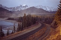 The Athabasca River railroad track at the mouth of Brule Lake in Alberta, Canada.