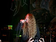 Sångaren John Tardy på scen under deras framträdande på New England Metal and Hardcore Festival 2005.