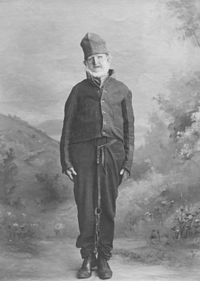 Fotografi av en man i fånguniform på Tasmanien från 1870-talet.